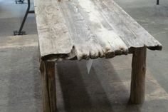 a table made out of wood in a workshop