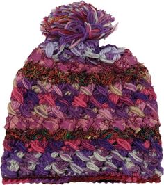 A melody of colors, this bright violet-hued hat is sure to make heads turn! With its pure wool and recycled silk, it has a cute pom-pom to top it up like a cherry on top of a sundae. The hat is one-size-fits-all and makes you look fabulous. #tlb #vacationclothing #Fall #Handmade #Skiing #PinkhandmadeWoolenHat #PompomWoolenHat #woolandsilkhat Purple Whimsical Winter Hat, Whimsical Purple Winter Hat, Purple Bohemian Hats For Winter, Purple Bohemian Winter Hats, Bohemian Purple Winter Hat, Purple Yarn Beanie For Winter, Casual Hand Knitted Purple Beanie, Warm Purple Crochet Yarn Hat, Warm Purple Crochet Hat