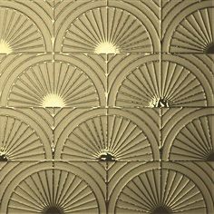 an art deco wallpaper with sunbursts on it