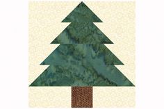 a quilted christmas tree is shown on the appliqued wallpapers