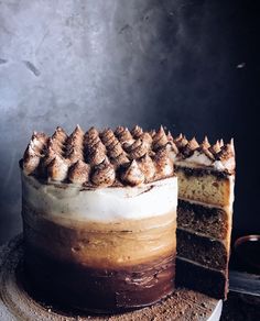 there is a cake that has been cut in half and ready to be served on the table