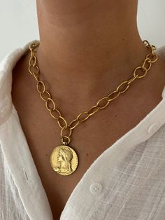 Antiqued gold coin necklace, 17in Vintage Gold-tone Chain Necklace With Coin Pendant, Gold-tone Medallion Necklace With Coin Pendant, Vintage Yellow Gold Coin Necklace, Tarnish Resistant, Vintage Gold-tone Coin Necklace, Vintage Tarnish-resistant Chain Necklace With Round Pendant, Vintage Gold Coin Necklace With Chain, Gold-tone Brass Coin Necklace, Vintage Coin Necklace With Tarnish Resistant Round Pendant, Vintage Round Coin Pendant Necklace