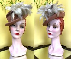 "vintage 1940s tilt hat, in a neutral cocoa brown wool felt ➡ moulded wool felt body -- a sturdy felt, not a floppy one ➡ giant feather floof across one side of the front ➡ the construction features a shallow curved-down brim in front + tall peaked crown + swoopy tilt panel in back -- definitely a perch style, jaunty atop your head ➡ elastic band in back, but you'll still want to use hat pin(s)  label: valerie modes material: felt, feathers  marked size: none present, fits me at 22. would work well for smaller, but i wold be wary about a bigger size.  diameter of main body: 9.5\" crown height: 3.5\" overall height including feather: 5\" condition: the bottom of the brim has some surface moth nibbles -- none that are holes, but still visible. see pic! nothing else to note + priced with nibb Felt Feathers, Tall Crown, 1940s Hats, Cocoa Brown, Hat Pin, Hat Pins, Figure It Out, Pantone Color, Fascinator