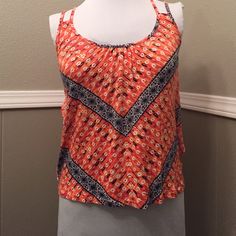 You'll Definitely Want To Show Off The Back Of This Cute Tank From Candies. Between The Ruffles, Double Straps And Pretty Gold Button, You'll Love The Compliments You Receive In This Tank. New With Tags. Orange Print, Gold Buttons, Color Orange, Ruffles, Womens Tops, Candy, Tank Tops, Orange, Tags