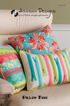 the pillows are all different colors and patterns on the chair with the name pillow trio