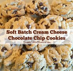 soft batch cream cheese chocolate chip cookies stacked on top of each other in a white bowl