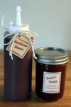 two jars of homemade barbecue sauce sitting on a table with the words, easy diy barbecue sauce