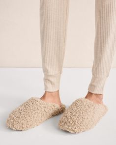 Slip on irresistible coziness and let delicious downtime begin. The softest sherpa surrounds your feet in warmth while the padded footbed provides comfort with every step. If you typically wear a half-size, size down for a more comfortable fit. Details + Design: Slip on. Material: 100% Recycled PolyesterImported | Cozy Sherpa Slippers Haven Well Within Cozy Round Toe Slippers For Relaxation, Comfy Winter Slippers With Textured Footbed, Comfortable Slippers With Faux Fur Lining For Fall, Winter Loungewear Slippers With Textured Footbed, Super Soft Comfortable Slippers For Loungewear, Cozy Soft Slippers For Lounging, Casual Cushioned Slippers For Loungewear, Comfortable Soft Slippers For Fall, Cozy Super Soft Slippers For Relaxation