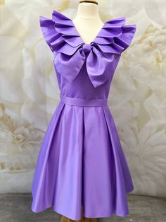 Beautiful interview dress with ruffles and bow made from high quality satin. Zipper back.  Included belt and hair bow. Color: purple.  Can  be made special for your little girl in any size and color. Satin Party Dresses With Sashes, Purple Satin Dress For Formal Occasions, Lavender Ruffled Dress For Party, Formal Purple Satin Dress, Lavender Party Dress With Ruffles, Lavender Ruffled Dress For Wedding, Elegant Purple Ruffled Dresses, Purple Ruffled Prom Dresses, Elegant Purple Satin Dress For Prom