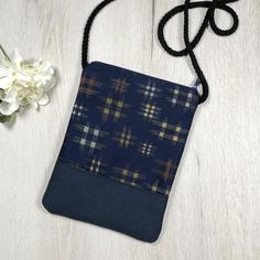 This cell phone bag has the right size for you to go shopping, to the gym or for a walk with your cell phone, ID card, keys and small things. There is a zipper on the top to keep things safe.Material: high quality canvas, cotton fabric, zipperDimension: 19.5cm x 15cm (7-3/4" x 5-7/8")Strap: 140cm (55")Inside: with cotton inner liningProduction time: about 3-4 working days (excluding holidays), shipped within two days after completion. ★other information--Kindly pls be noted that the fabric and l Rectangular Everyday Zipper Phone Bag, Rectangular Zipper Pouch Phone Bag For Travel, Rectangular Phone Bag With Zipper Pouch For Travel, Functional Blue Phone Bag With Cell Phone Pocket, Functional Rectangular Phone Bag With Cell Phone Pocket, Blue Rectangular Phone Bag As Gift, Blue Rectangular Phone Bag For Gift, Blue Rectangular Phone Bag Gift, Rectangular Blue Phone Bag Gift