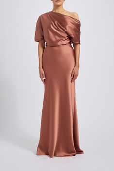 The Slouch Dress - Fluid Satin off-one-shoulder draped bodice gown with bias column skirt. Shown in Sienna, Black, Champagne, Navy, Fuchsia, Jade, Gold, Hunter, Ice, Lipstick-Red, French-Blue, Olive, Petrol, Slate, and Truffle. It is possible to have this style Made-to-Order in any of our standard Fluid Satin colors, please reach out to customerservice@amsale.com to place an order. Orange Mother Of The Bride Dresses, Neutral Mother Of The Bride Dress, Ice Lipstick, Grandma Dress, Satin Colors, Lace Capelet, Amsale Dress, Open Back Gown, Draped Bodice