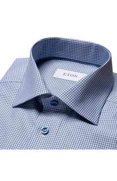 Expand your professional wardrobe with a stretch-kissed dress shirt patterned with a small-scale gingham print. French placket Spread collar 49% cotton, 49% lyocell, 2% elastane Machine wash, line dry Made in Romania Business Cotton Checkered Shirt, Business Gingham Cotton Shirt, Business Cotton Gingham Shirt, Gingham Cotton Dress Shirt For Work, Cotton Gingham Dress Shirt For Work, Fitted Gingham Shirt With Spread Collar, Classic Houndstooth Pattern Shirt For Work, Classic Houndstooth Shirt For Workwear, Classic Houndstooth Shirt For Work