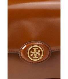 The Robinson Spazzolato Convertible Shoulder Bag from Tory Burch is the perfect everyday bag for your Instagram lifestyle. With leather construction and fold-over flap with magnetic snap closure, it offers both style and convenience whether worn across the body or by the handles. Adjustable crossbody strap allows you to go hands-free while exploring the city or hanging with friends. Interior organization and exterior pockets keep your essentials secure. Structured base and branded hardware give this versatile bag a polished look to complete your Instagram outfit of the day. Designer Flap Shoulder Bag With Cc Turnlock Closure, Classic Leather Bag With Cc Turnlock Closure, Modern Business Shoulder Bag With Cc Turnlock Closure, Modern Shoulder Bag With Cc Turnlock For Business, Modern Calf Leather Shoulder Bag With Turn-lock Closure, Leather Satchel With Cc Turnlock Closure, Business Flap Bag With Designer Lock Closure, Leather Shoulder Bag With Cc Turnlock And Top Handle, Business Flap Bag With Cc Turnlock Closure