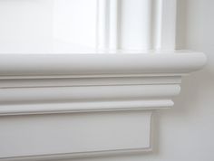 the corner of a window with white trim