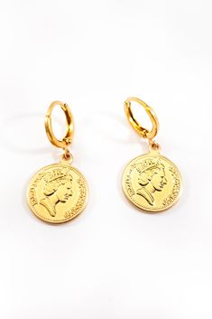 This super chic earring has a vintage look and feel that will take you back to old world Europe. The Gianna Earring features a small coin, whose design is inspired by the Baroque period. The coin is attached to a small hoop so that you can enjoy a dangling earring that will highlight your face and add just the right amount of shine and glow. While the Gianna is designed with the past in mind, it still fits in well with the modern world of fashion and will look good with any outfit. At Koko Carpi Baroque Period, Coin Earrings, Chic Earrings, Baroque Style, Baroque Fashion, World Of Fashion, Period, 18k Gold, Dangle Earrings