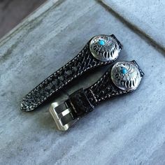 Transform your watch into a statement piece with our Turquoise Stone & Leather Watch Strap. This unique strap combines the natural beauty of turquoise gemstones with the durability of premium leather, creating a stunning accessory that stands out. Designed specifically for Apple Watches and other timepieces, this strap is available in widths of 18mm, 20mm, and 22mm, ensuring a perfect fit. The vibrant turquoise stones contrast beautifully with the rich leather, making it a striking choice for an Silver Leather Strap Watch Bands As Gift, Silver Watch Bands With Leather Strap, Silver Watch Accessories With Leather Strap For Gift, Silver Watches With Adjustable Black Band, Luxury Adjustable Watch Band With Stainless Steel Clasp, Silver Watch Bands With Stainless Steel Clasp, Silver Watch Band With Stainless Steel Clasp, Silver Watch Band With Stainless Steel Clasp For Everyday, Adjustable Silver Leather Watch Band