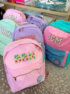 DOORBUSTER - THESE WILL COME PLAIN NO PATCHES! Our Letter Backpacks are customizable letter patches that allow you to showcase your unique personality and style. With a wide range of letters to choose from, you can easily create your own initials, and monograms, or even spell out meaningful words or phrases. The patches attach securely to the backpack, adding a personalized touch that sets you apart from the crowd. Designed with functionality in mind, these backpacks offer ample storage space an Affordable Color Block Backpack For Back To School, Pink School Bag With Letter Patch, Pink School Bags With Letter Patch, Backpacks With Patches, Neoprene Backpack, Neoprene Bag, Letter Patches, Backpack Patches, Best Travel Accessories