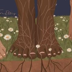 two people standing in the grass with their bare feet up and flowers growing out of them