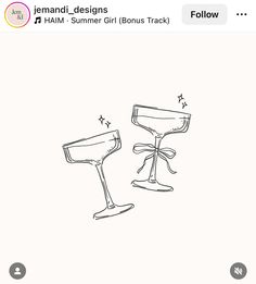 two wine glasses sitting next to each other on top of a white sheet with the words,