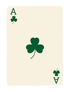 a four - leaf clover playing card with the letter a on it's side