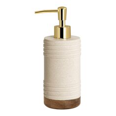 a soap dispenser with a wooden handle and gold accents on the top