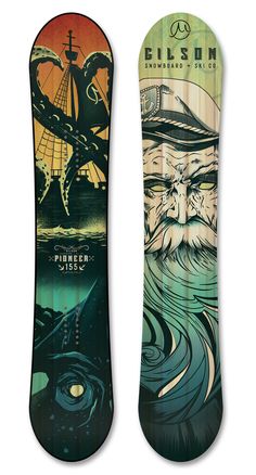 two snowboards side by side one with an image of a ship and the other with a boat on it