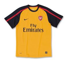 a yellow and black soccer jersey with the word fly emirates on it's chest