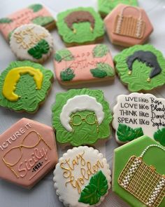 decorated cookies with words and pictures on them