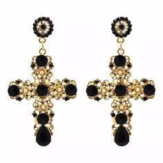 Our Sovereign Cross Collection has 7 different styles of opulent gothic style cross earrings that feature dangling ornate crosses. A bit of rock-star charm adds to an old European glam of these earrings. Gold/Silver - about 3 1/4 in. long Maroon/Black Gems - about 3 1/2 in. long Ornate + Colorful Gens - about 3 1/2 in. long Ear Piercings Earrings, Jewelry Set Simple, Big Dangle Earrings, Vintage Statement Earrings, Golden Cross, Earrings Triangle, Goth Earrings, Boho Crystal, Cable Bracelets