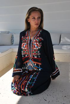 "A stunning embroidered Kaftan dress that is elegant, colorful, and unique! The dress is made of Egyptian cotton that has a soft feel to it so you will surely feel comfortable and royal in it. It also comes with a small invisible pocket on the right side of the Kaftan for added practicality. You can wear this Kaftan practically anywhere and for any occasion. You can dress it up with a pair of heels and strut like an Egyptian queen in any gathering, resort, or party. Or you can dress it down with Multicolor Embroidered Maxi Dress, Beach Tunic For Eid In Maxi Length, Eid Beach Tunic Maxi Length, Eid Beach Maxi Length Tunic, Blue Embroidered V-neck Kaftan, Eid Beach Maxi Tunic, Summer V-neck Embroidered Abaya, Summer Embroidered V-neck Abaya, Traditional Long Sleeve Maxi Dress For Vacation