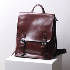 Full Grain Leather Backpack Purse Women Leather Rucksack Convertible Shoulder Bag Model Number: T9320L Dimensions: 10.6"L x 4.7"W x 12.6"H / 27 cm(L) x 12 cm(W) x 32 cm(H) Weight: 1.8 lb / 0.8 kg Hardware: Gunmetal Hardware Shoulder Strap: Adjustable Color: Brown / Coffee / Black Features: • Genuine Natural Leather• Inside 1 Cell Pocket, 1 Money Pocket, 2 Zipper Pockets.• YKK Zipper• Adjustable Shoulder Strap• Can fit an iPad. Leather School Bag, Convertible Backpack Purse, Aesthetic Backpack, Money Pocket, Purse Essentials, Leather Backpack Purse, Leather Rucksack, Genuine Leather Bags, Girl Backpacks