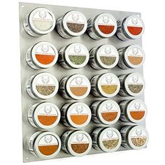 an assortment of spices and seasonings displayed on a wall