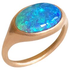 Dalben design One of a kind 18 kt rose gold matte finishing ring with a 3,31 carat bezel-set oval deep blue lovely Lightning Ridge Australian Opal . The stone has deep blue green spots . Ring size 7 1/4 - EU 55 re-sizable to most finger sizes. Bezel setting dimension: max width 15,4 mm, max height 10,3 mm. The ring has been designed and handcrafted in our atelier in Italy Como with a rigorous quality workmanship . Opal Rose Gold Ring, Italy Como, Paraiba Tourmaline Ring, Rose Gold Opal Ring, Lightning Ridge Black Opal, Opal Diamond Ring, Blue Opal Ring, Red Tourmaline, Black Opal Ring