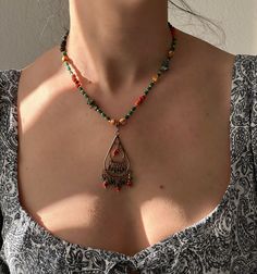 This Handmade Ethnic Necklace is a very unique beaded jewelry, which is going to be yours if you are here.  Its ethnicity and elegance comes from the traditional tribal ethnic design and boho minimalist string structure. It is designed and produced by local shaman artisans. Shamanism is known as a nature worship belief. Shamans bound their soul with nature. Our necklace is designed and is became alive with this bound. If you would like a distinctive, unique, ethnic and dainty necklace, Zoho Accessories is your right place to be ! It's a great necklace for yourself or as a gift for a beloved person on Mother's Day, as a Birthday gift, Christmas gift, and all other special days! Necklace length: 18 Inches (Adjustable length) If you have any questions, write me anytime and I happily to answer Nature Worship, Unique Beaded Jewelry, Tibetan Jewelry, Boho Minimalist, Ethnic Necklaces, Ethnic Design, Ethnic Jewelry, Dainty Necklace, Tear Drop