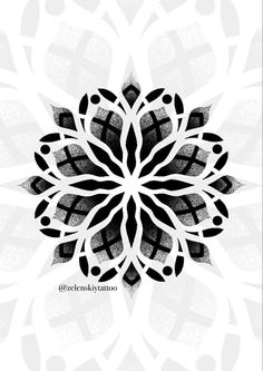 a black and white flower on a white background