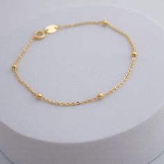 stay stylish every day with the dream a little dream bracelet. the delicate construction makes it the perfect everyday accessory for all your layered looks, or to be worn alone for a beautiful, classic look. pick up this essential piece to start creating beautiful layered looks. 18kt BR gold filled 7.5" long Everyday Gold Bracelet For Women, Gold Bracelet For Girls Simple, Adjustable Simple Gold Bracelet, Adjustable Delicate Gold Bracelet For Everyday, Delicate Gold Bracelet With Satellite Chain For Everyday, Everyday Gold Bracelet With Satellite Chain, Minimalist Gold Plated Charm Bracelet For Everyday, Minimalist Gold Plated Bracelets For Layering, Delicate Round Chain Bracelet For Everyday