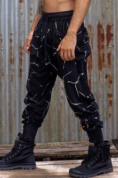 The Mens Lowriders in Black Marble. Made from Mid weight cotton jersey featuring big side pockets and an elastic drawstring waist, and ribbed cuffs. Each item is indivdually hand dyed to create the Marbled effect. These stylish and very comfortable pants are great for after Gym wear, on the dance floor, and everyday. The perfect outfit when combined with the Hooded long sleeve in the Idis Range. https://www.etsy.com/au/listing/199760679/long-sleeve-top-mens-hoodie-hooded-shirt?ref=shop_home_acti Alternative Style Cotton Pants With Cargo Pockets, Alternative Style Cotton Bottoms With Cargo Pockets, Alternative Cotton Bottoms With Cargo Pockets, Baggy Alternative Cotton Pants, Baggy Cotton Alternative Style Pants, Hip Hop Cotton Pants With Belt Loops, Hip Hop Cotton Bottoms With Belt Loops, Alternative Cotton Trousers, Alternative Style Cotton Trousers