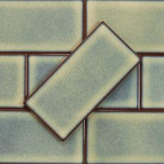 two square tiles on top of each other