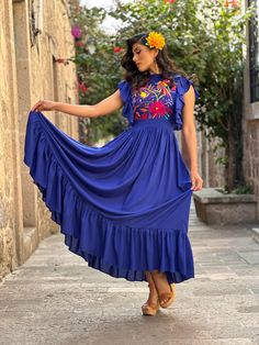 This beautiful traditional Mexican Dress has a design that is distinguished by its beautiful embroidered details around the neck which are completely hand embroidered. The length of the dress reaches to the ankles and its gown cut design makes this a simple and fresh model. It has ties in the back for an adjustable fit. This beautiful dress is hand made and hand embroidered by Mexican Artisans in Guanajuato, Mexico. More dresses here: https://www.etsy.com/es/shop/SoleiEthnic?ref=seller-platform- Mexican Dresses For Women Traditional, Traditional Mexican Dress For Women, Traditional Mexican Outfits For Women, Mexican Wedding Guest Outfit, Mexican Inspired Wedding Dress, Mexican Prom Dress, Mexican Dresses For Women, Mexican Inspired Dress, Mexican Dresses Traditional