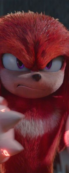 an animated character with red hair and blue eyes in a scene from sonic the hedgehog