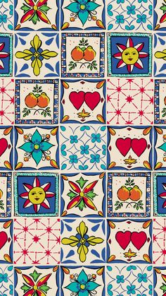 a colorful tile pattern with hearts and flowers