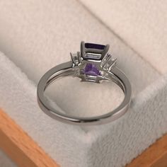 Emerald Cut Amethyst Ring For Formal Occasions, Elegant Emerald Cut Amethyst Ring, Elegant Emerald Cut Amethyst Promise Ring, Purple Emerald Cut Ring For Formal Occasions, Formal Purple Emerald Cut Ring, Purple Emerald-cut Ring For Formal Occasions, Elegant Emerald Cut Amethyst Birthstone Ring, Elegant Emerald-cut Amethyst Birthstone Ring, Emerald Cut Amethyst Ring In White Gold