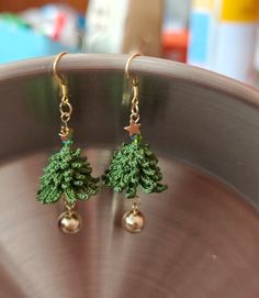 Celebrate the festive spirit with our hand-woven Christmas tree earrings, meticulously crafted to capture the joy and charm of the holiday season. Each pair is lovingly woven by skilled artisans, showcasing intricate patterns and vibrant colors reminiscent of Christmas trees adorned with ornaments. These earrings are a perfect blend of whimsy and craftsmanship, ideal for adding a touch of holiday cheer to your attire. The hand-woven design ensures each pair is unique, making them a special acces Christmas Tree Crochet Earrings, Christmas Tree Beaded Earrings, Tree Earrings, Christmas Tree Earrings, Earring Tree, Woven Design, Gift Exchange, Intricate Patterns, Holiday Cheer