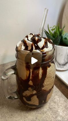 a glass mug filled with ice cream and chocolate