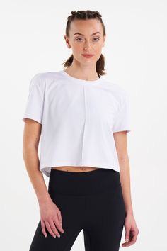 Our ALSPRT Pintuck Tee is a modern basic that will rise to the top of your wardrobe. It’s cut for an easy, flattering fit. The tailored pintuck detail and crop design will set this apart from the commonplace tee. Versatile Cropped Tops With Relaxed Fit, Casual Cropped Top With Minimal Stretch, Sporty Stretch Tops With Shirttail Hem, Athleisure Relaxed Fit Crop Top, Athleisure Crop Top With Relaxed Fit, Modern Stretch Workout Tops, Athleisure Crop Top With Minimal Stretch, Relaxed Fit Crop Top In Athleisure Style, Cropped Athleisure Top With Minimal Stretch