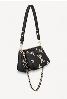 Brand New Multi Pochette Accessoires Bicolor Monogram Empreinte Black/ Cream. Comes with Box, Dustbag, Tags, and Removable Chain/Strap. Guaranteed Authentic! "The Multi Pochette Accessoires cross- body bag takes on a striking aspect in embossed black Monogram Empreinte leather, overprinted with the Monogram motif in a cream color. Just the right size to carry a woman's essentials, this two-in-one bag keeps things organized with its removable pouches. It's comfortable to wear thanks to its supple Bolsa Luis Viton, Luis Viton, Pochette Louis Vuitton, Louis Vuitton Multi Pochette, Coach Tote Bags, Luxury Purses, Louis Vuitton Pochette, Pretty Bags, Bags Designer Fashion