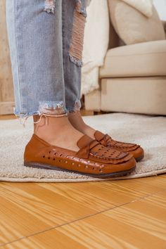 Add a whimsical touch to the day's style with these classic loafer featuring eye-catching perforated detail. The supple soft leather design gently conforms to your foot and is breathable for lasting comfort. 0.78" heel Pull-on Leather upper Leather lining Leather footbed Rubber sole Casual Leather Loafers With Perforations, Brown Slip-on Loafers With Perforations, Summer Leather Loafers With Perforations, Spring Leather Loafers With Perforations, Leather Loafers With Perforations For Summer, Leather Perforated Loafers For Summer, Spring Leather Moccasins With Perforated Toe Box, Leather Slip-on Flats With Perforations, Spring Flat Heel Faux Leather Loafers