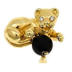 Tiger Cub with Ball Brooch | From a unique collection of vintage brooches at https://www.1stdibs.com/jewelry/brooches/brooches/ Gift Yellow Gold Brooches With Single Cut Diamonds, Diamond Yellow Gold Brooches Fine Jewelry, Yellow Gold Diamond Brooches Fine Jewelry, Yellow Gold Diamond Brooch Fine Jewelry, Yellow Gold Diamond Brooch In Fine Jewelry Style, Yellow Gold Diamond Gemstone Brooches, Gold Diamond Brooch With Gemstone, Yellow Gold Diamond Pendant Brooch, Tiger Cub