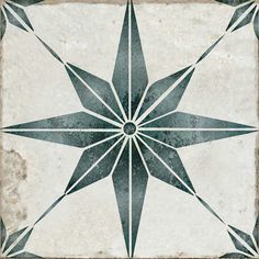 an artistic tile design in shades of grey and white with a star pattern on the center