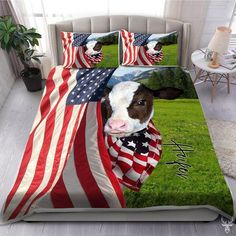 a cow with an american flag on it's face is shown in this bedding set